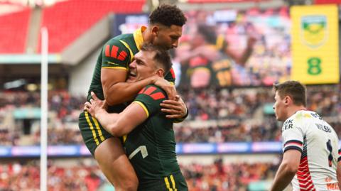 Angus Crichton celebrates