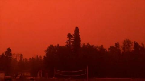 The sky is orange due to Canada's wildfires.