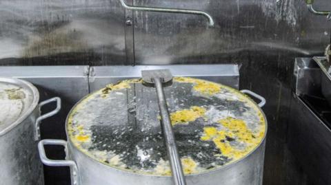 Dirty restaurant pots