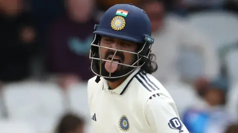 India batter Rishabh Pant falls on the floor after hitting a shot