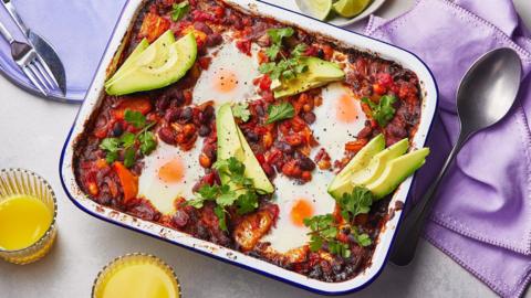 Breakfast traybake with beans, egg and avocado