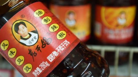 Lao Gan Ma (The Godmother) brand chili seasoning in the supermarket.