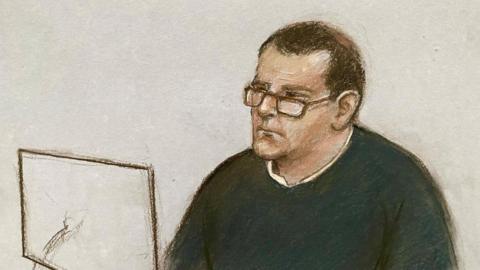 Court artist sketch by Elizabeth Cook of Paul Quinn appearing in the dock at Manchester Crown Court, where he is accused of rape in 2003. Andrew Malkinson was wrongly convicted and spent 17 years in jail for the crime. 