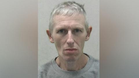 Mugshot of Anthony Whitesmith. He is pale and has short white hair.