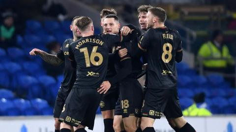 QPR players celebrate