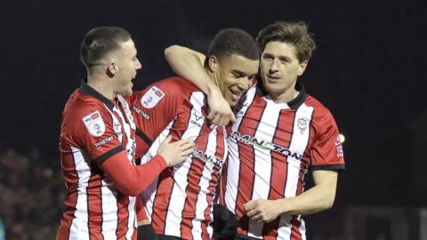 Lincoln City celebrate a goal