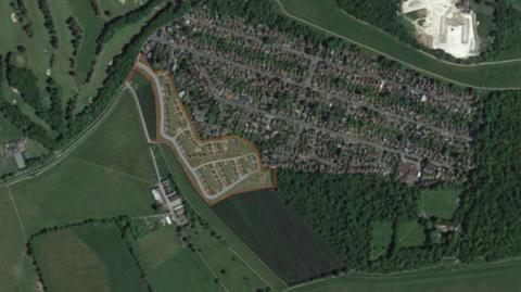 An aerial view of the proposed Langley Vale development. It appears to cover more than five hectares (0.02 square miles) of agricultural farm land at Langley Bottom Farm, adjacent to Langley Vale village.