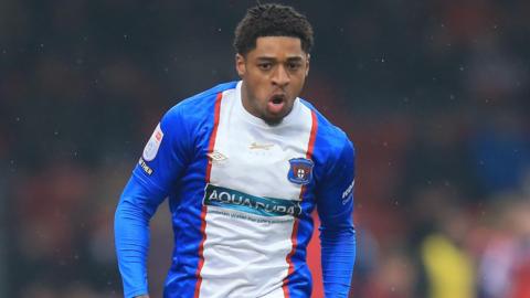 Kadeem Harris in action for Carlisle