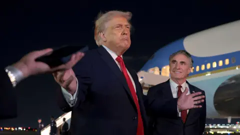 Trump outside Air Force One.