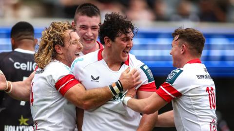 Ulster players celebrate a try