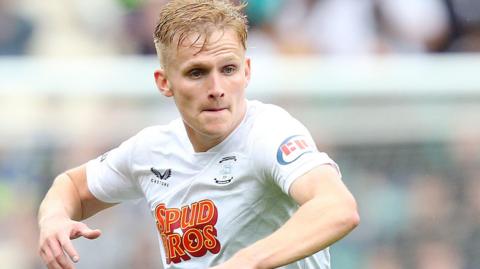 Ali McCann in action for Preston