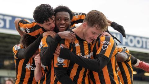 Abu Kamara of Hull City (c) celebrates scoring a goal 