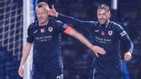 Scott Brown and Lewis Jamieson celebrate