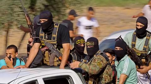 Hamas militants on the back of a truck