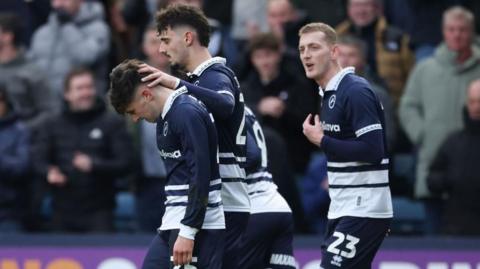 Millwall celebrate Luke Cundle's goal against QPR