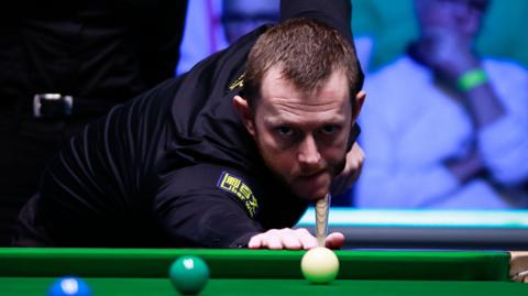 Mark Allen playing a shot