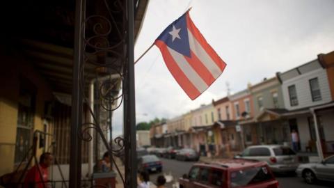 Puerto Rican flag flies from a home in North Philadephia.