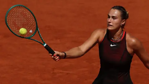 Aryna Sabalenka hits a forehand