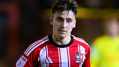 Liam Oakes in action for Exeter City