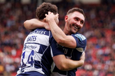 Bristol Bears players Jack Bates and Richard Lane embrace as they celebrate a try scored against Exeter Chiefs at Ashton Gate