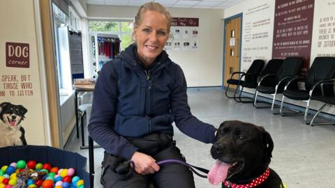 Natalie Rhodes with Daffodil the dog