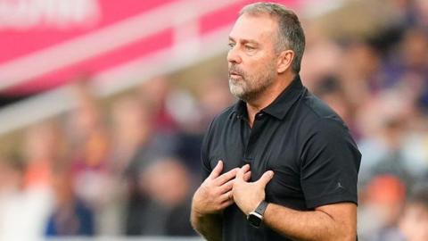 Barcelona coach Hansi Flick reacts to being shown a red card