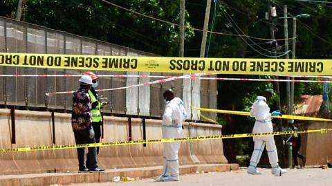 Forensic personnel at the crime scene