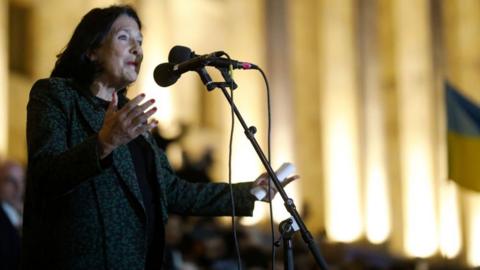 President Salome Zourabichvili outside parliament