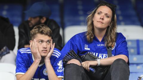 Leicester fans look dejected