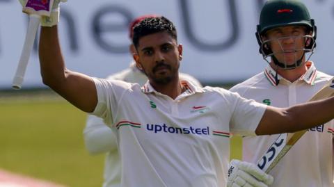 Rishi Patel celebrates scoring century