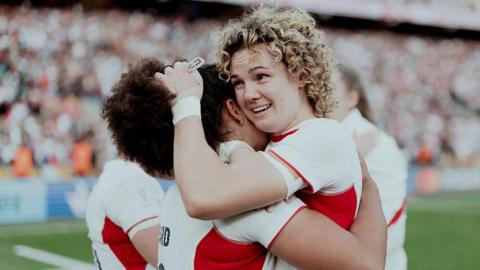 Ellie Kildunne hugging Tatyana Heard at full-time of the World Cup final 