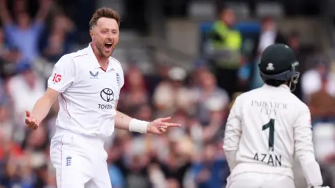Ollie Robinson celebrates a wicket