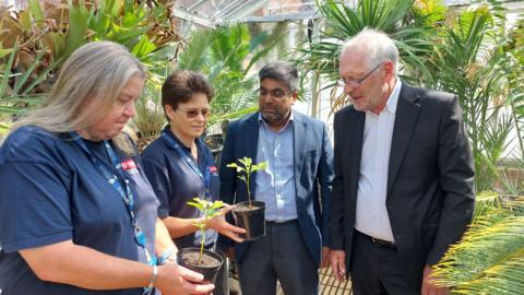 From left: June Saddington and Rachel Benskin from the Botanic Garden team, with University Vice-Chancellor Professor Nishan Canagarajah and Mayor of Leicester, Sir Peter Soulsby.