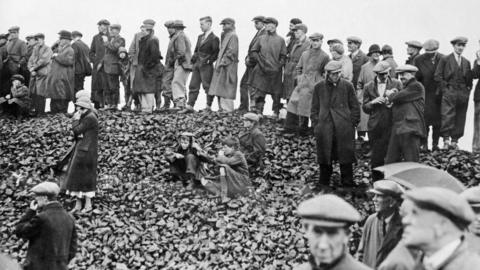 Miners await news after the Gresford colliery disaster