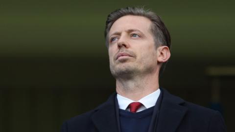 Michael Edwards at a Premier League match