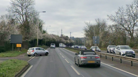 Cars on a dual carriageway on a dull day