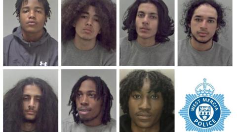 Seven mug shots of seven different men. Pictured (clockwise from top left) are Cadaine July, with short hair and dreadlocks wearing an Under Armour coat, Jahmya Farrell with long hair, Esa Hussain, with shoulder length hair; Ethan Powell with curly hair; Musa Hussain with long hair and a moustache; Caleb Barnes with dreadlocks down to his neck and Acaree Crossgill with dreadlocks. All but one of the men are in grey sweatshirts in front of a grey background.