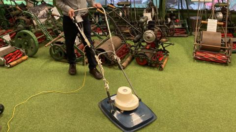 The blue Flymo Electric 38A on display at the British Lawnmower Museum