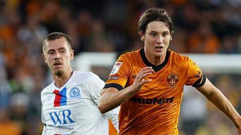 Blackburn's Todd Cantwell challenges Wolves' Fer Lopez