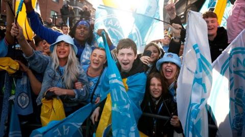 Manchester City fans celebrate