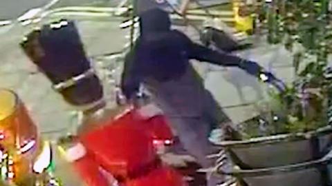 A thief steals a Nutcracker soldier from outside a pub in Scotland