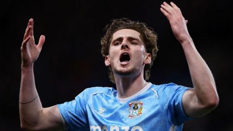 Jack Rudoni celebrates scoring for Coventry