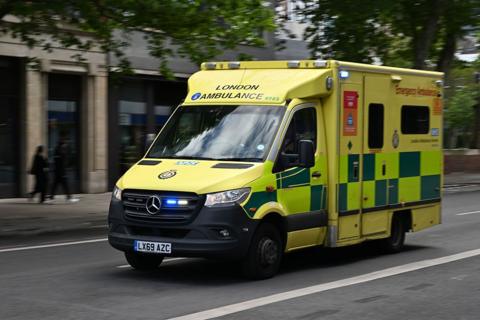 An NHS ambulance responds to an emergency call in London