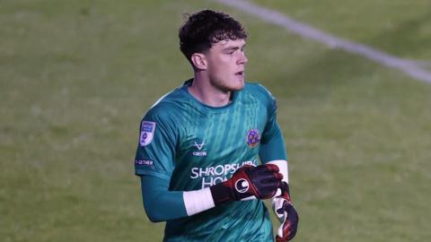 Shrewsbury Town goalkeeper Will Brook in action