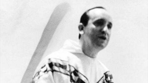 A young Pope Francis is seen in robes as a younger man
