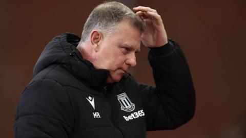 Stoke boss Mark Robins scratches his head during the 2-1 defeat to Middlesbrough