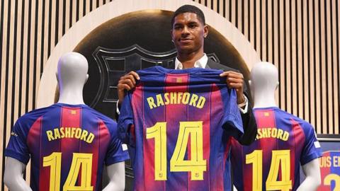 Marcus Rashford with the Barcelona number 14 shirt