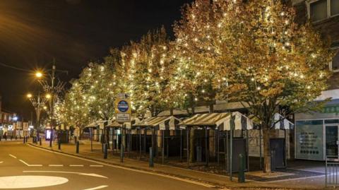 Festoon lighting in the trees along Wednesfield High Street