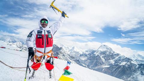 Hari at the peak of Mount Meera