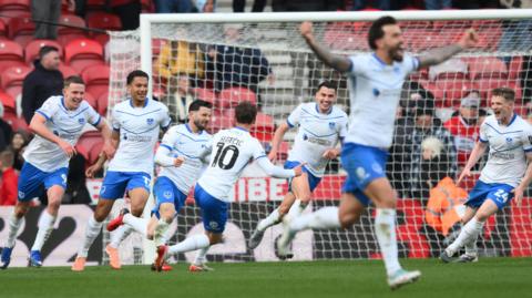 Portsmouth celebrate late winner at Middlesbrough